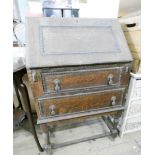 A Jacobean style bureau fitted two drawers under on turned legs 2' wide