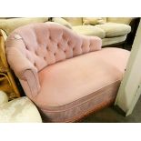 A small pink Dralon upholstered chaise longue