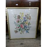 A gilt framed needlework picture of flowers