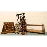 Striking mantle clock in oak case, carved wood sage, religious figure,