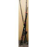 A 10' sea fishing rod with multiplier fishing reel and four other fishing rods