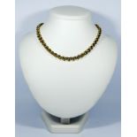 A modern two tone 18ct gold fancy link chain necklace in yellow and white contrasting gold, 41.