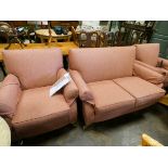 A small multi york two seater settee three piece lounge suite in pink covering together with a