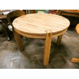 Circular light oak parquetry topped dining table on heavy square legs
