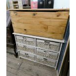 A limed oak effect chest with six wicker drawers and a pine blanket box