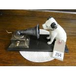 A painted iron 'His Masters Voice' advertising ornament (dog with gramophone)
