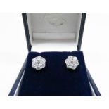 Pair of good quality diamond daisy cluster ear studs, hallmarked 18ct white gold.