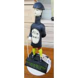 A painted iron Guinness figure money box