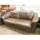 A two seater chocolate brown leather settee and one matching chair