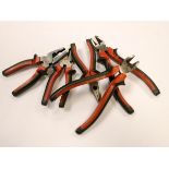 Five assorted pairs of pliers