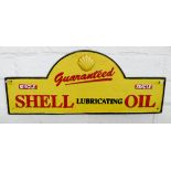 A large Shell Lubricating Oil sign