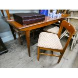Matching previous lot is the matching extending dining table together with eight chairs with