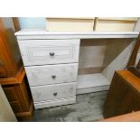 A pale light oak finished single pedestal dressing table fitted three drawers and a matching narrow
