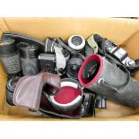 A box of cameras, camera lenses,