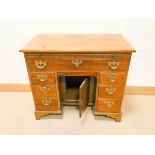 Edwardian style mahogany kneehole pedestal desk fitted one long,