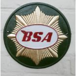 A green BSA motorcycle cast iron plaque