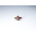 Victorian pink topaz and seed pearl ring on an unmarked yellow gold shank,
