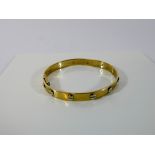 Cartier style love bangle in 9ct yellow gold,