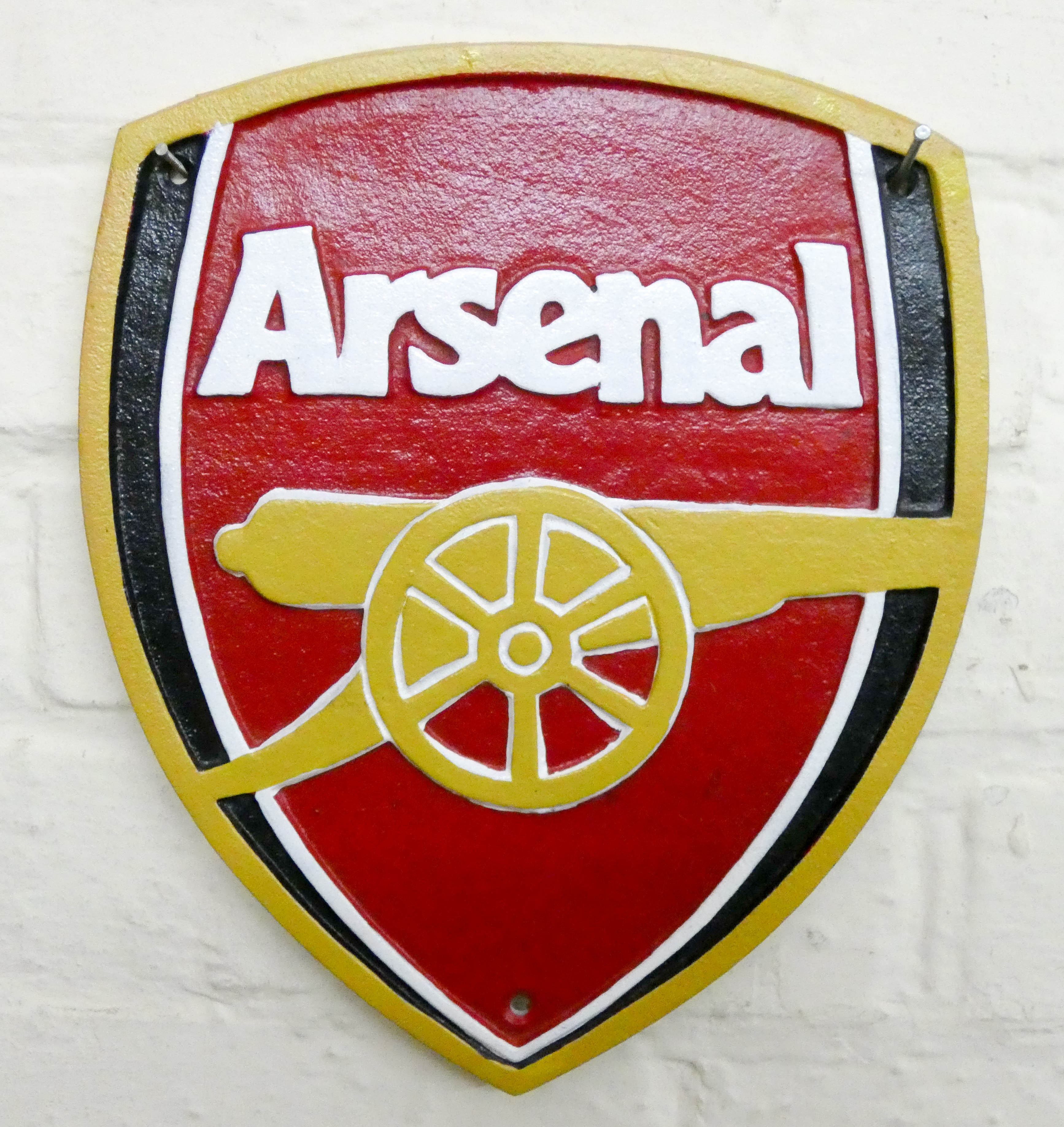 A large cast iron Arsenal sign