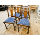 Set of four oak dining chairs on turned legs with blue upholstered seats