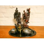 A tortoiseshell smokers companion set and a pair of carved hardwood Chinese figures