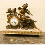A French Empire striking mantle clock with gilt lady violinist mount and cherub by Tessier Bernard
