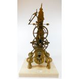 A copy of an antique brass skeleton clock with fusee movement standing on marble plinth base