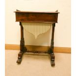 A Victorian walnut work box fitted drawer on a carved fret style base with cross stretcher,