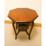 An Edwardian walnut octagonal occasional table on cabriole style legs