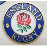 A cast iron England Rugby wall hanging plaque