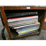 A quantity of LP records in a wooden case