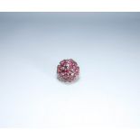 Large ruby cluster cocktail ring on a 14ct yellow gold cage setting,