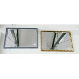 A bevelled mirror in gilt frame and another in blue frame
