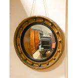 A Regency style circular convex wall mirror in gilt frame 17" diameter overall