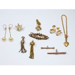 A collection of Edwardian and later gold to include brooches,