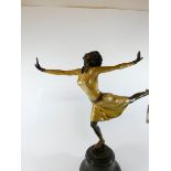 A cold painted bronze of a lady skater signed Cezaro on marble base approx 15" tall