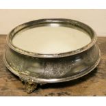 A circular plated mirrored wedding cake stand approximately 15" diameter