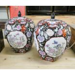 A pair of Cantonese ginger jars with covers decorated with flowers and butterflies 11" high
