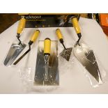 A new five piece plasterer and bricklayers trowel set