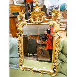 A Georgian style wall mirror in carved gilt wood frame overall 37" x 23"