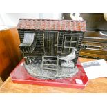 A model of an old fashioned pigeon loft on stand