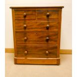 A Victorian mahogany chest of three long and two short drawers with bun handles 3' wide