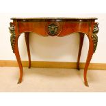 A French Kingwood serpentine front hall or side table with cross banded top and gilt metal