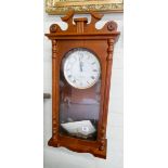 A quartz Westminster chiming wall clock