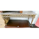 A gilt framed coffee table with marble top and a gilt framed wall mirror