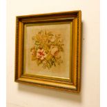 A gilt framed needlework picture of flowers 12 1/2" square