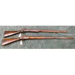 Two military style percussion muskets complete with their ramrods,