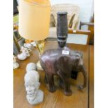 Carved African busts, two stone busts, carved wood elephant,