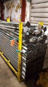 Lot of (125+/-) metal cargo/logistic bars with storage stand