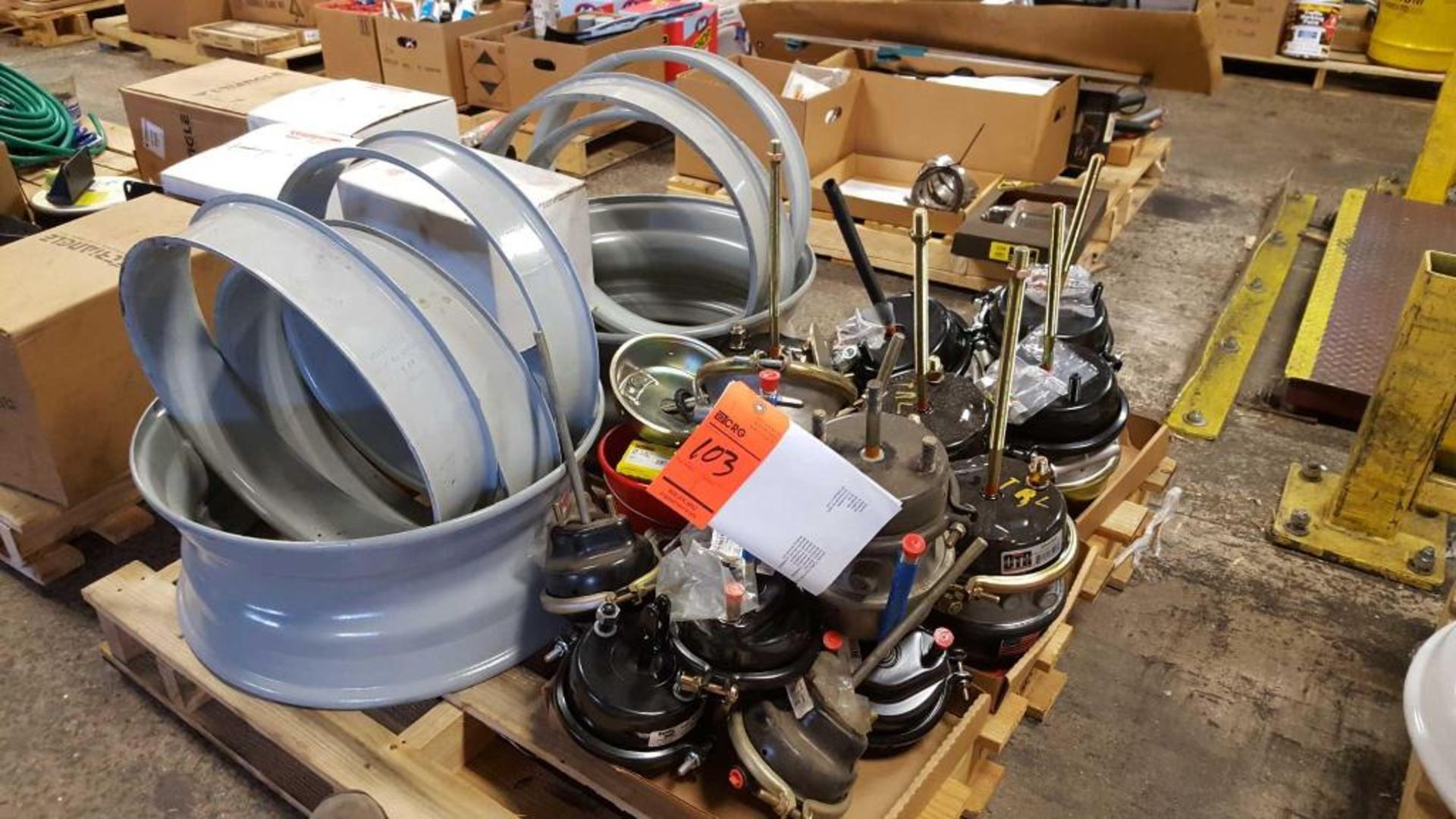 Lot of assorted brake chambers and tubeless rims, etc.